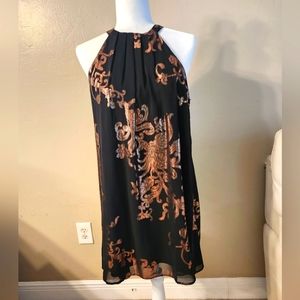 Black and gold hulter dress. Light weight flowy
